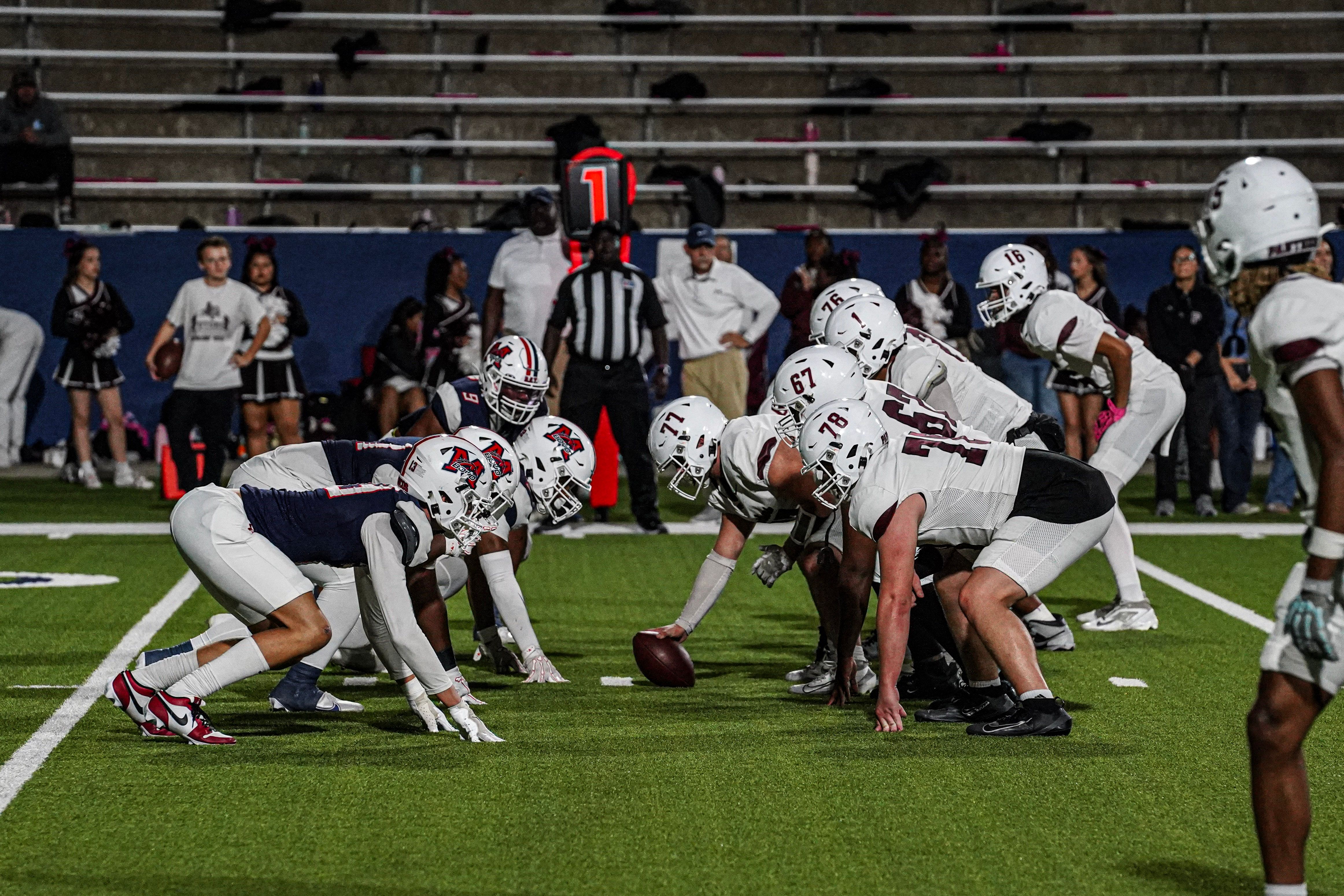 McKinney Boyd Broncos player making a block during a Friday night game